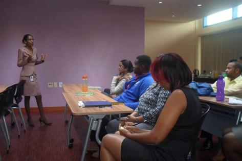 Ms. Anisha Ramadhar of the Consumer Affairs Division, lecturing Staff of Environmental Management Authority, South.